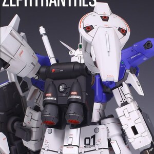 May include: A detailed, close-up view of a white, blue, and black model robot. The model has intricate mechanical details, including thrusters, vents, and the number "01" printed on various sections. The text "PROJECT 01 ZEPYHRANTHES" is at the top.