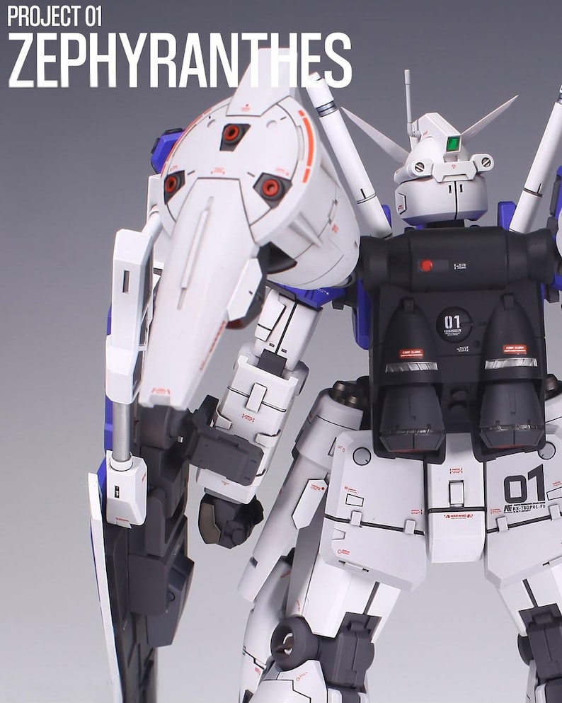May include: A white and blue model robot with the text "PROJECT 01 ZEPHYRANTHES". The robot has a detailed design with red and black accents. The robot has multiple panels and a large shield.