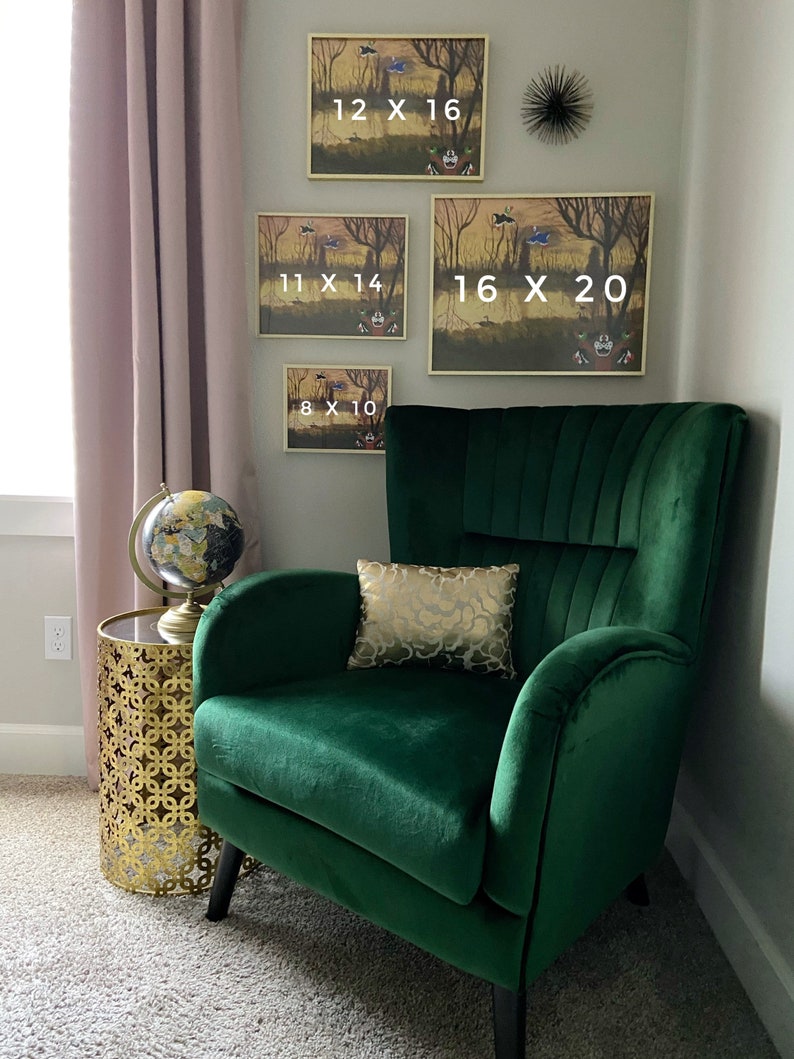 May include: A cozy living room scene featuring a deep green velvet armchair, a gold side table, and framed artwork. The artwork, in various sizes (8x10, 11x14, 12x16, and 16x20 inches), depicts a whimsical forest scene. A decorative gold pillow rests on the chair.