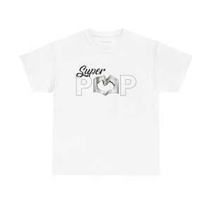 May include: White t-shirt with the words "Super POP" in black script and block letters. The "O" in "POP" is a heart shape. The shirt is made of a soft material.