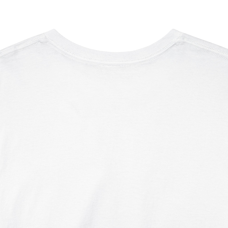 May include: A close-up shot of a white t-shirt, focusing on the neckline and upper chest area. The shirt is plain, with a simple, round neckline and a smooth, clean texture. The fabric appears to be a soft, lightweight material.