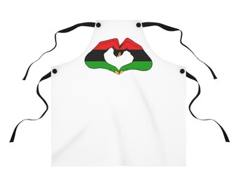 Delantal panafricano con diseño de corazón, rojo, negro y verde, ajustable, ideal para cocinar.