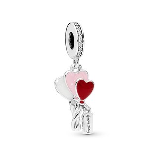 May include: A silver charm featuring three heart-shaped balloons in white, pink, and red. The charm has a small tag that reads "Happy Birthday". The top of the charm has a ring with clear stones.