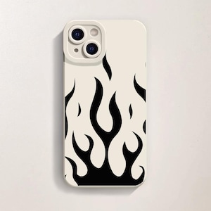 May include: A cream phone case with a black flame design. The case has a smooth finish and a camera lens cutout. The flame pattern is stylized and covers the lower half of the case.