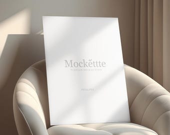 Vertical Canvas Mockup in Armchair | Editable PSD & JPEG | 2000x2000 px | 300 DPI | Minimal Cream Interior Scene