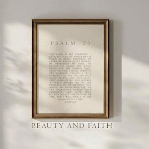 May include: A framed print with the text of Psalm 23, in a gold-colored frame. The words "Beauty and Faith" are printed at the bottom of the image. The background is a neutral color.