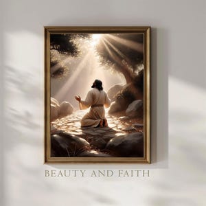 May include: Framed artwork depicting a figure kneeling on a stone path, bathed in sunlight filtering through trees. The figure wears a white robe and has long, dark hair. The artwork is in a gold frame, with the words "BEAUTY AND FAITH" at the bottom.