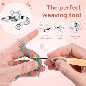 May include: A silver-colored metal yarn tension ring shaped like a cat with ears and a tail, worn on the index finger to guide green yarn while using a crochet hook. The image includes text stating The perfect weaving tool, Exquisite and compact, Can be stored, and Adjustable size.