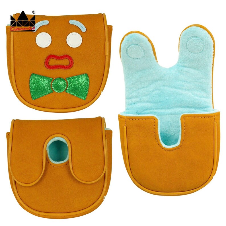 K&ouml;nnte beinhalten: Golfschl&auml;gerhauben-Set im Lebkuchenmann-Design. Die Bez&uuml;ge sind braun mit wei&szlig;en, roten und gr&uuml;nen Akzenten. Die Innenseite ist hellblau. Das Set enth&auml;lt eine H&uuml;lle mit Gesicht, eine H&uuml;lle mit Klappe und eine H&uuml;lle mit U-f&ouml;rmiger &Ouml;ffnung.