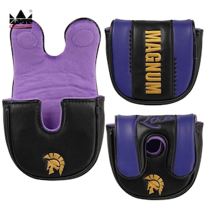 K&ouml;nnte beinhalten: Schwarze und lila Golf-Putter-Schl&auml;gerhauben. Eine Haube ist ge&ouml;ffnet und zeigt ein lila Innenfutter. Die Hauben haben goldgestickte Logos und das Wort "MAGNUM". Die Hauben sind aus strapazierf&auml;higem Material gefertigt.