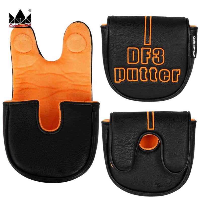 K&ouml;nnte beinhalten: Schwarze Golf-Putter-Schl&auml;gerhaube mit orangefarbenen Akzenten. Der Schriftzug "DF3 putter" ist orangefarben. Die Innenseite ist orange. Das Craftsman Golf-Logo ist sichtbar.