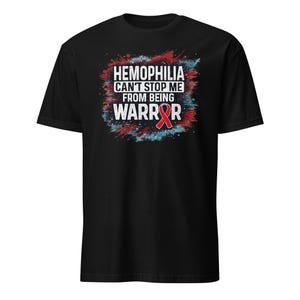 May include: Black t-shirt with the text "HEMOPHILIA CAN'T STOP ME FROM BEING WARRIOR" in white, red, and blue. The design includes a red ribbon, a symbol of hemophilia awareness. The shirt is a crew neck style.