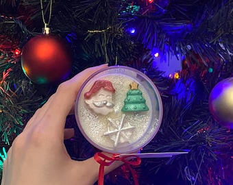 Handcrafted Christmas Candle with Holiday Figurines