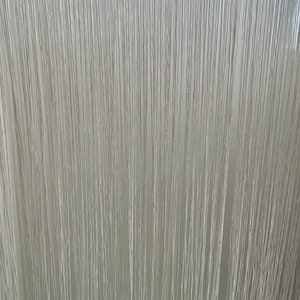 May include: White fringe trim with a scalloped edge. The fringe is about 1 inch long.