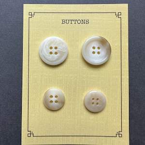 Crèmekleurige claxonknop met 4 gaten B.4