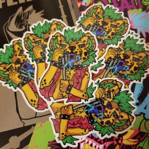 May include: Five colorful stickers featuring a cartoon cheetah with green hair, wearing a red and black jacket, holding a silver chain with a padlock. The cheetah is licking its lips and has blue drool dripping from its mouth.