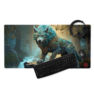 May include: A large rectangular mouse pad featuring a detailed illustration of a wolf with teal fur and gold accents, set against a forest backdrop with a waterfall. A black keyboard, mouse, and headphones are also visible.