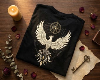 Camiseta gráfica Phoenix: Ave Fénix dorada, diseño de geometría sagrada.