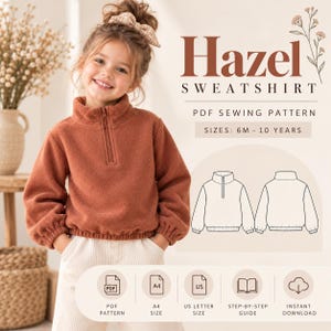 Könnte beinhalten: Ein rostfarbenes Fleece-Sweatshirt mit Viertelreißverschluss am Stehkragen und elastischen Bündchen. Der Text lautet Hazel SWEATSHIRT PDF SEWING PATTERN SIZES: 6M - 10 YEARS. Enthält eine technische Zeichnung sowie Symbole für PDF, A4, US, Anleitung und Download.