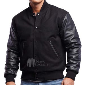 May include: A black varsity jacket featuring a wool-blend body and contrasting black leather sleeves. The jacket includes a ribbed collar, cuffs, and hem, a front snap-button closure, and two side pockets with leather trim. The Nova Jackets logo is visible.