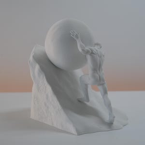 May include: A matte white sculpture depicting a muscular figure pushing a large sphere up a steep, textured incline. The figure is shown from behind, with arms extended upward against the round object, set against a plain, neutral background.