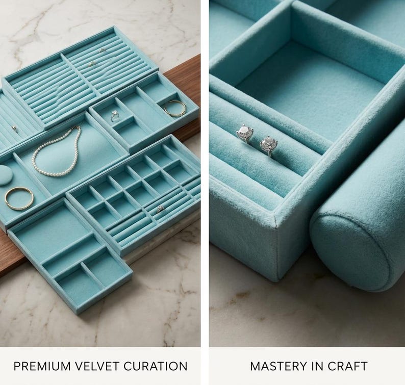 May include: A collection of light blue velvet jewelry organizers with various compartments, including ring slots and necklace holders. The text "PREMIUM VELVET CURATION" and "MASTERY IN CRAFT" are displayed below the organizers. The organizers are on a light-colored surface.