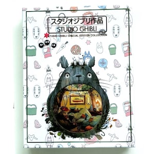 May include: A Studio Ghibli Special Edition Collection box set. The box features a large illustration of Totoro with a detailed interior scene. The box is white with various character illustrations and Japanese text.