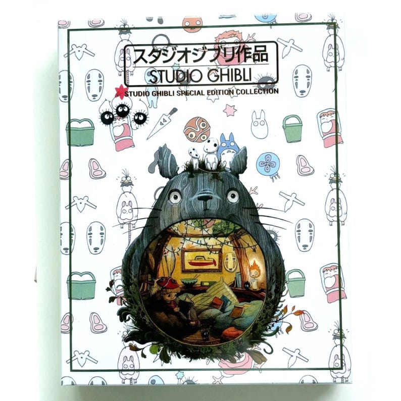 May include: A Studio Ghibli Special Edition Collection box set. The box features a large illustration of Totoro with a detailed interior scene. The box is white with various character illustrations and Japanese text.
