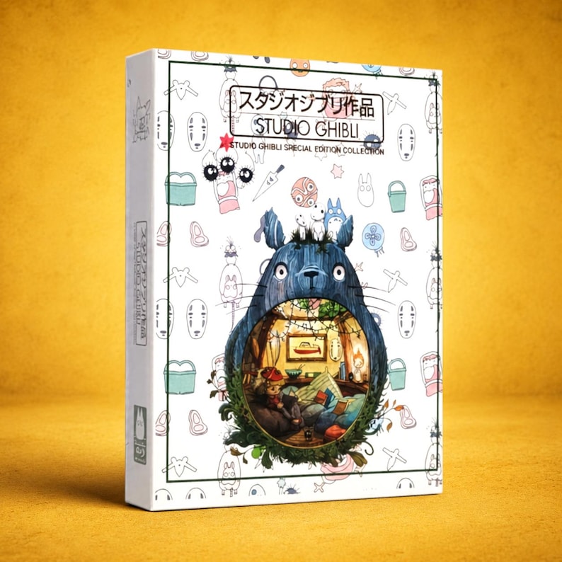 May include: A Studio Ghibli Special Edition Collection box set. The white box features a blue Totoro illustration with a cozy interior scene. The box is decorated with various character illustrations and Japanese text.