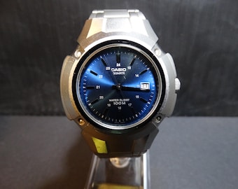 カシオ腕時計 メンズ レア 42mm シルバートーン デイト ブルーダイヤル デイト MTP3036