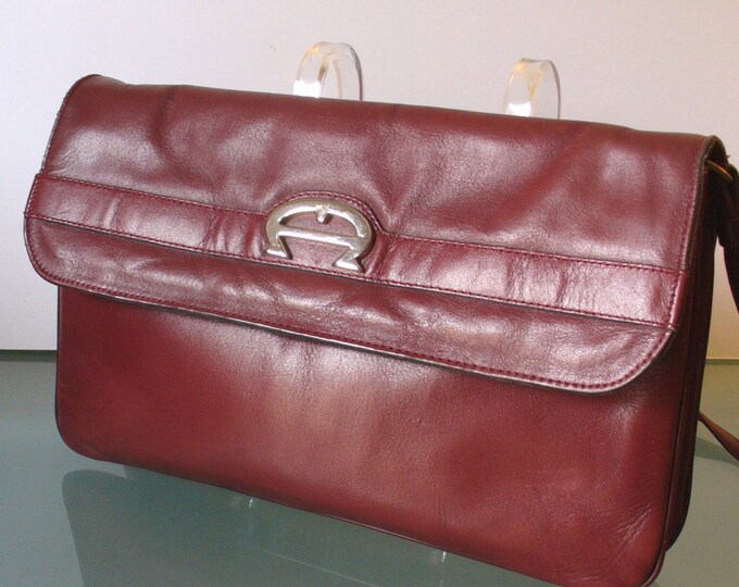 Featured listing image: Vintage Etienne Aigner Oxblood Clutch With Detachable Strap