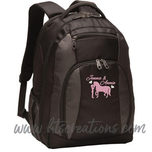 May include: Black backpack with gray accents and multiple zippered compartments. Features a pink embroidered design of a horse and the text "Jenna & Annie". Includes the website address www.htscreations.com.