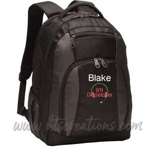 May include: Black backpack with a gray panel featuring the name "Blake" and the text "911 Dispatcher" with a headset icon.