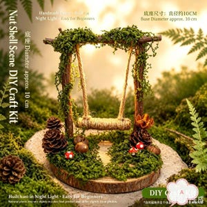 May include: A DIY craft kit featuring a miniature swing set on a circular wooden base with a 10 cm diameter. The scene includes brown pinecones, small red and white mushrooms, and green moss. Text on the image reads Nut Shell Scene DIY Craft Kit.