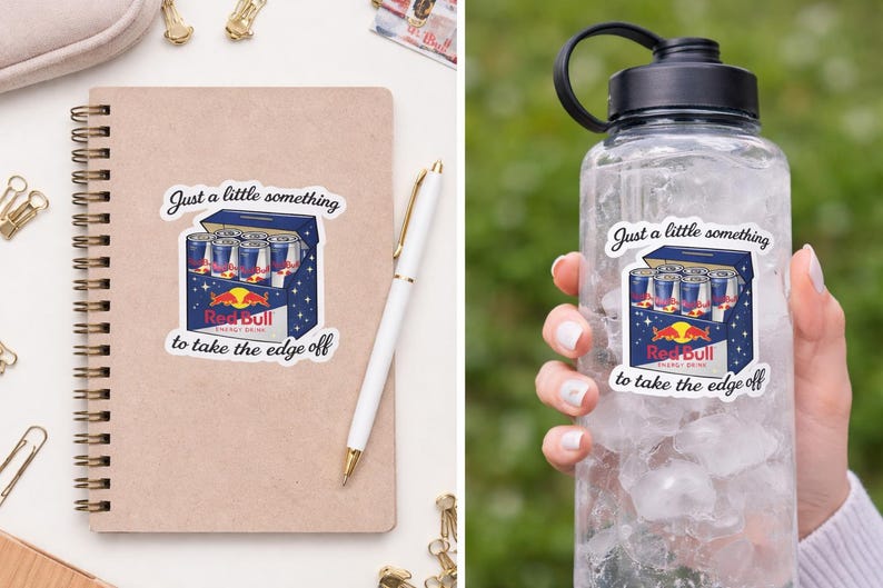 May include: A sticker showing a cartoon Red Bull energy drink carton with the text "Just a little something to take the edge off." The sticker is on a notebook and a water bottle.
