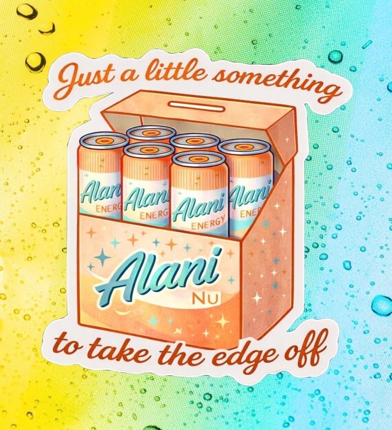 May include: A sticker depicting a cartoon box with six Alani Nu energy drink cans. The cans are orange and white, with the brand name visible. The sticker includes the text "Just a little something to take the edge off."