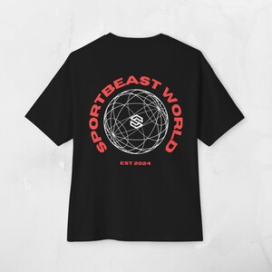 May include: Black t-shirt with a white and red graphic on the back. The graphic features a globe design with the words "SPORTBEAST WORLD" in red around the globe. The text "EST 2024" is below the globe.