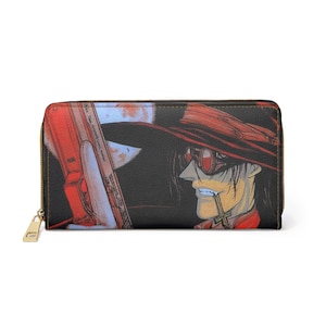 Puede incluir: Una cartera negra con una ilustración detallada de un personaje con sombrero rojo, gafas y un colgante de cruz. El diseño incluye un arma roja y una luna. La cartera tiene una cremallera dorada.