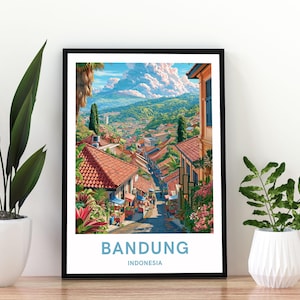 May include: A framed vertical art print featuring a vibrant landscape of Bandung, Indonesia. The illustration depicts a hillside town with red-tiled roofs, lush greenery, and a mountain under a cloudy blue sky. The text BANDUNG INDONESIA is at the bottom.