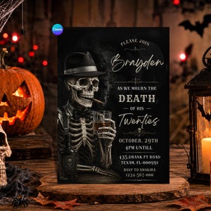 May include: A black rectangular invitation card featuring a skeleton wearing a fedora, bowtie, and suspenders, holding a glass of whiskey and a cigar. The text reads: PLEASE JOIN BRAYDEN AS WE MOURN THE DEATH OF HIS TWENTIES OCTOBER, 29TH 4PM UNTILL.