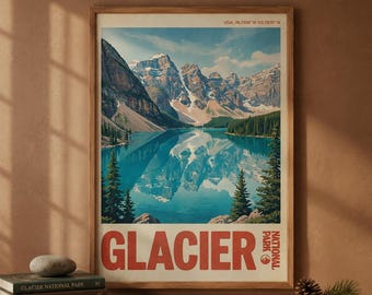 May include: A framed wall art print featuring a landscape illustration of Glacier National Park with snow-capped mountains reflecting in a turquoise lake, surrounded by pine trees. The text GLACIER NATIONAL PARK is printed in large red letters.