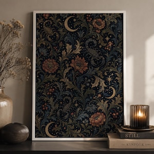 May include: A framed rectangular wall art print featuring a dark navy blue background with a dense botanical pattern of rust-coloured flowers, green foliage, golden crescent moons, stars, and scorpions arranged in a repeating celestial design.