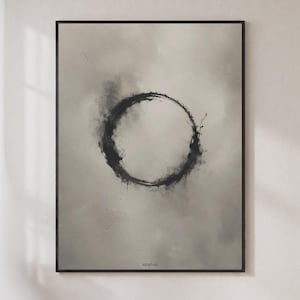 May include: A framed rectangular wall art print featuring a textured light gray background with a large, dark, ink-like circular brushstroke in the center. The word ARRIVAL is printed in small, simple black capital letters at the bottom center.