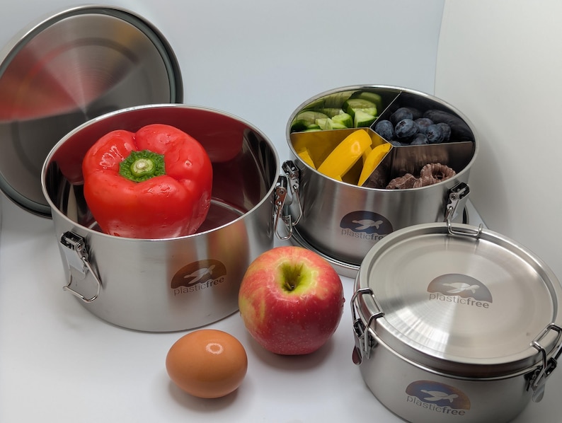 Large, medium divided, and small stainless steel containers shown together