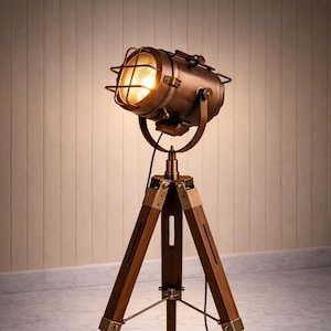 May include: A set of three ceramic mugs with a speckled, matte finish. The mugs are in shades of cream, light brown, and dark brown. Each mug has a simple, minimalist design and a rounded handle.