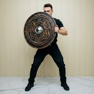 Hand Carved Viking Shield 24 Inch | Wooden Round Shield Wall Decor | Norse Serpent Dragon Design | Medieval Rustic Home Decor Display Gift image 3