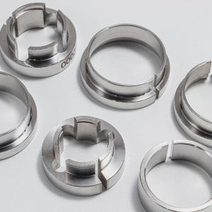 a collection of metal rings or components, likely used in a manufacturing or industrial context.
