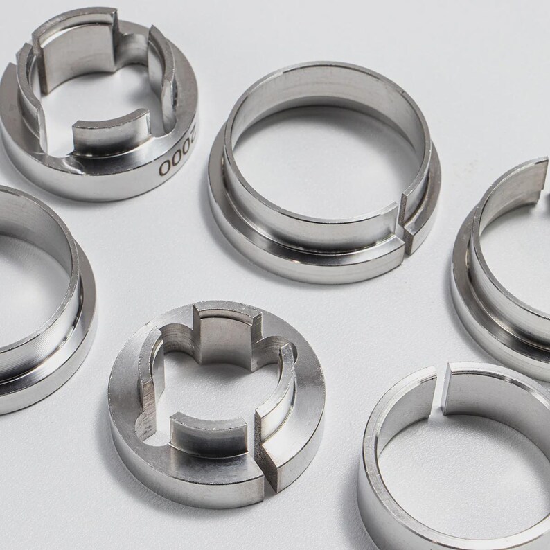a collection of metal rings or components, likely used in a manufacturing or industrial context.