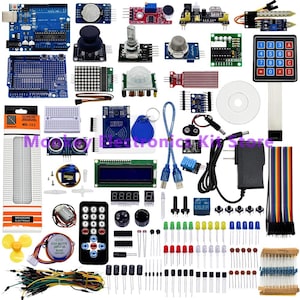 May include: A collection of electronic components, including Arduino boards, sensors, breadboards, and various modules. The image features a variety of colors and shapes, with text that reads "MB-102" and "BREADBOARD ELECTRONIC". Ideal for electronics enthusiasts and hobbyists.
