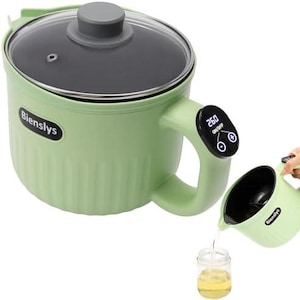 May include: A light green electric cooking pot with a glass lid and a digital display on the handle. The pot has a handle and a spout, and a smaller matching pitcher is pouring liquid into a glass jar. The pot has the brand name "Bienslys".